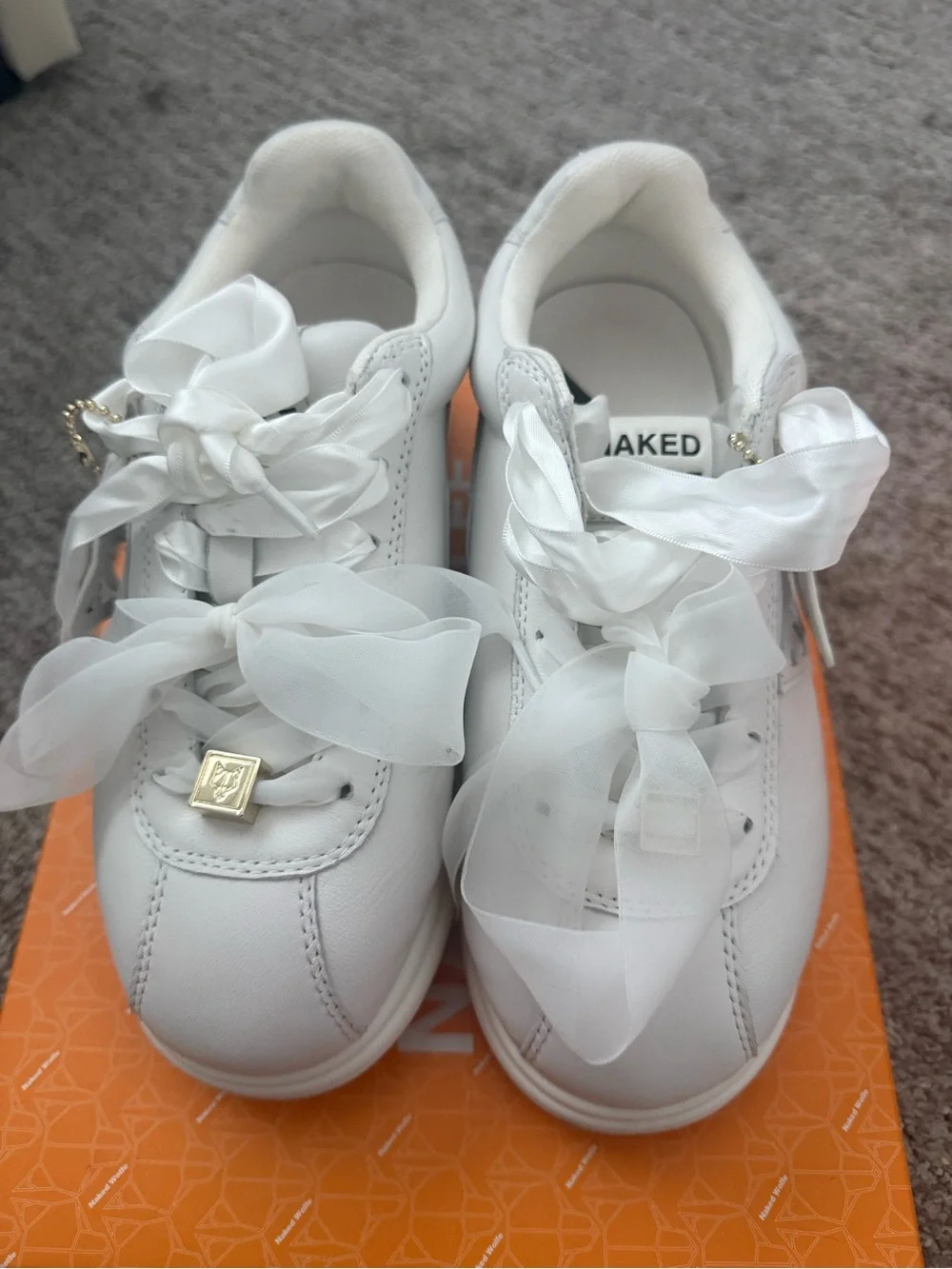 Naked Wolfe Women White Ribbon Lace-Up Sneakers with Gold Charm